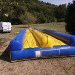 location de jeux aquatiques gonflables - LE VENTRIGLISSE JAUNE ET BLEU 2 PISTES