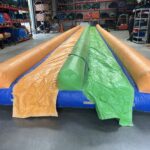 location de jeux aquatiques gonflables - LE VENTRIGLISSE ORANGE 2 PISTES